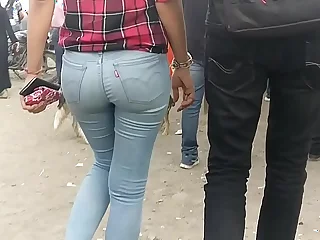 Crestfallen Indian round ass girl walking relating to public